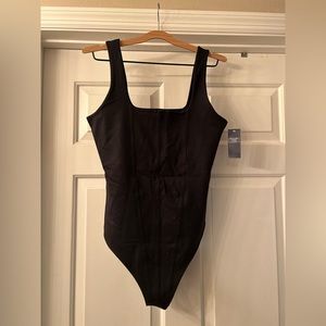 Black corset-like bodysuit